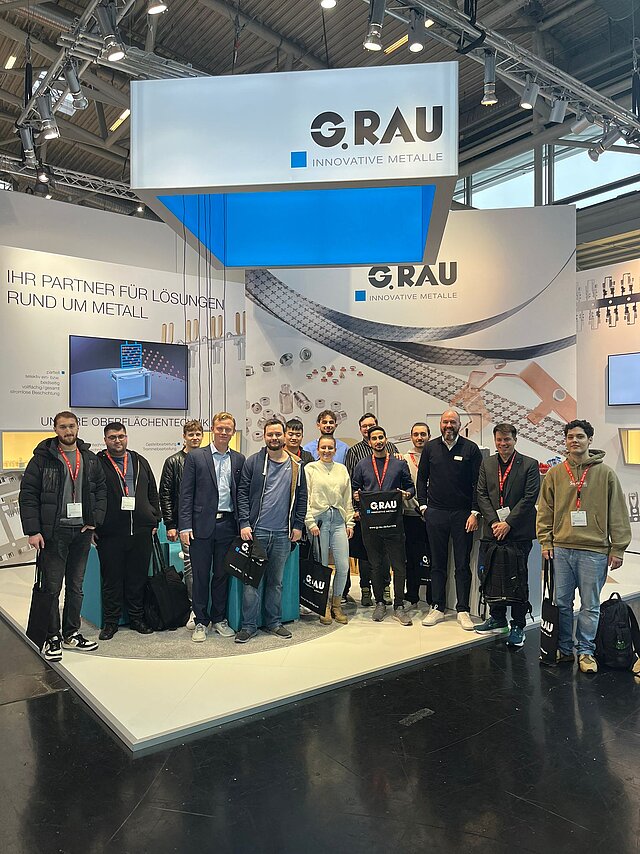 Gruppenfoto am Gemeinschaftsstand von EUROFLEX GmbH und ADMEDES GmbH in Düsseldorf.